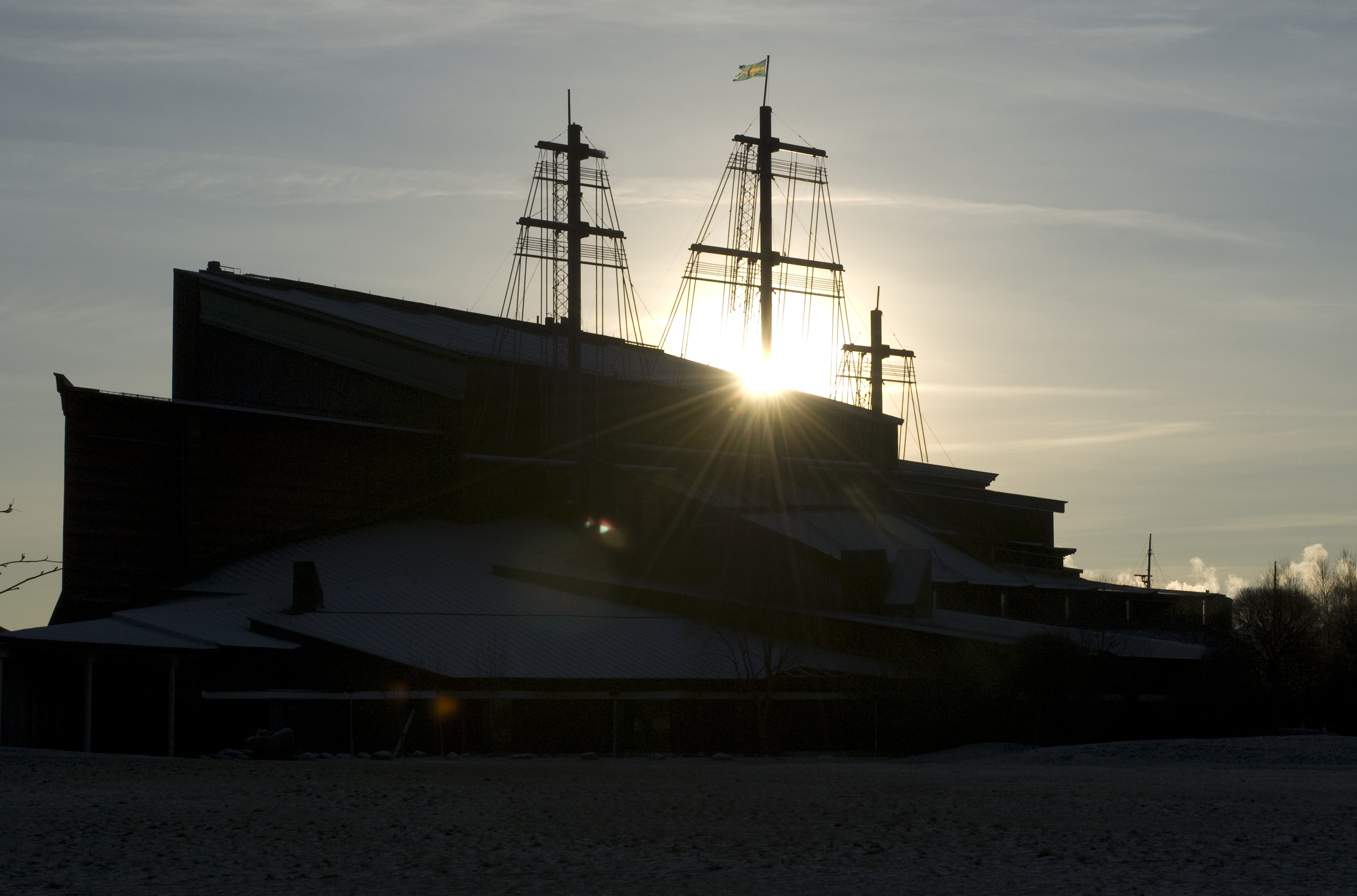 The Vasa Museum's dark, dramatic exterior in backlight.
