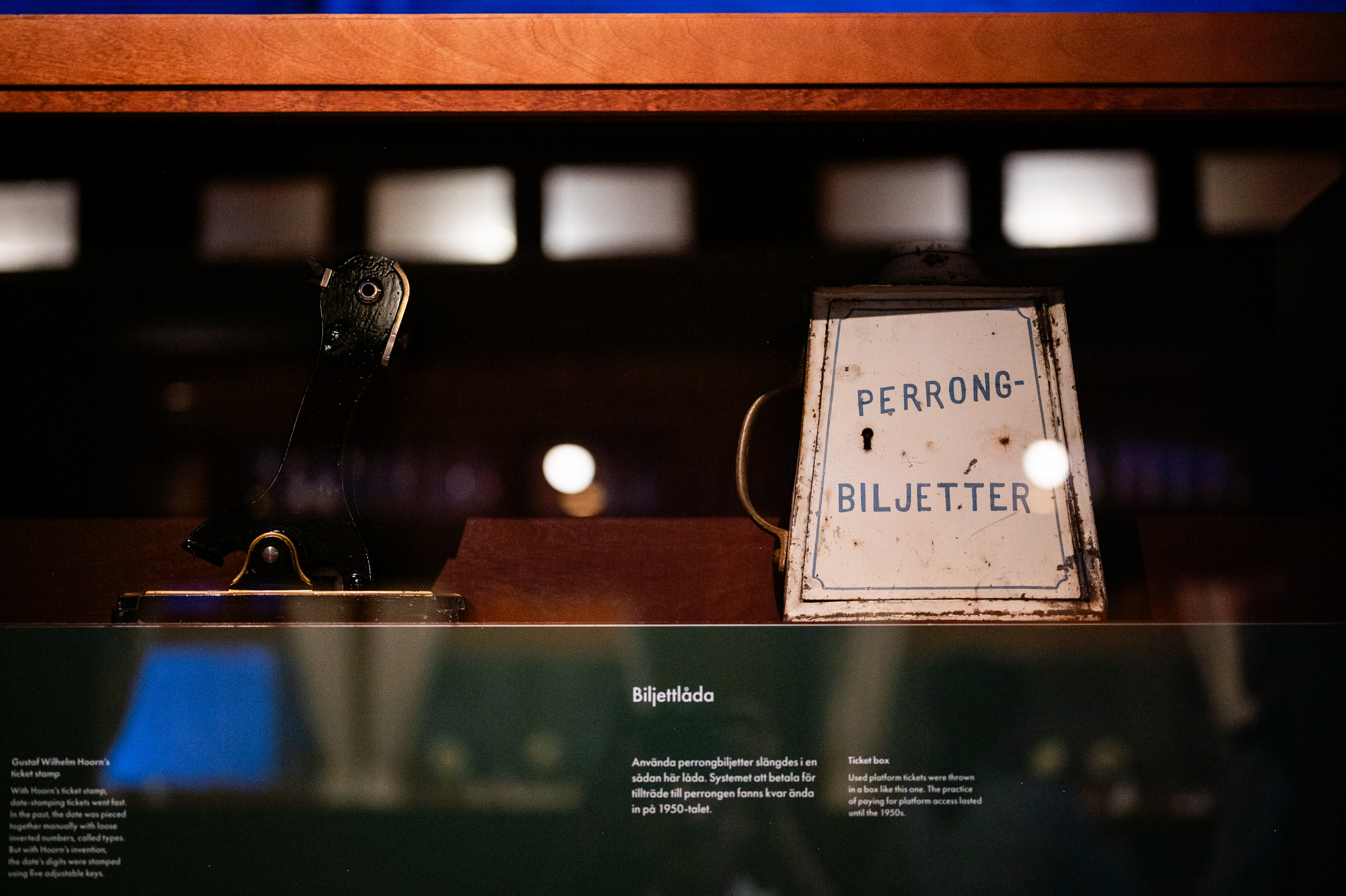 A white box with blue text that reads platform tickets, from one of the exhibitions